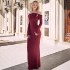 Burgundy off-shoulder fitted maxi dress showcasing elegant fashion and style in ملابس