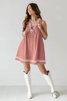 Beautiful embroidered vest denim dress in pink with white trim