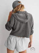 Cozy loose hooded sweatshirt in gray langry fashion with striped shorts