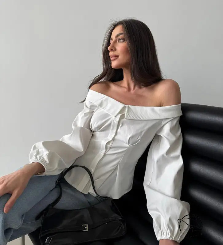 Elegant French off-shoulder white blouse with billowy sleeves by Langry