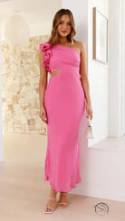 Woman in enchanting slim fit pink one-shoulder dress