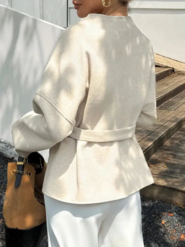 Cream-colored woolen casual holiday strap long sleeve blazer jacket in fashion ملابس