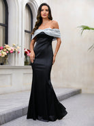 Elegant off-the-shoulder black gown in Fashion, perfect for ملابس events and occasions
