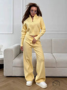 Langry yellow zip-up tracksuit with high collar, white sneakers, slim fit fashion ملابس