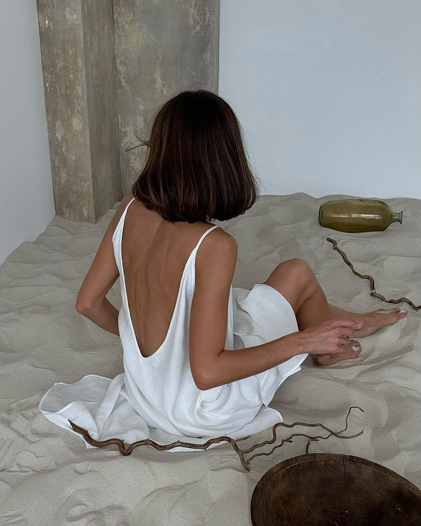 White langry fashion open-back dress with ruffled hem, spaghetti straps, ideal pajamas