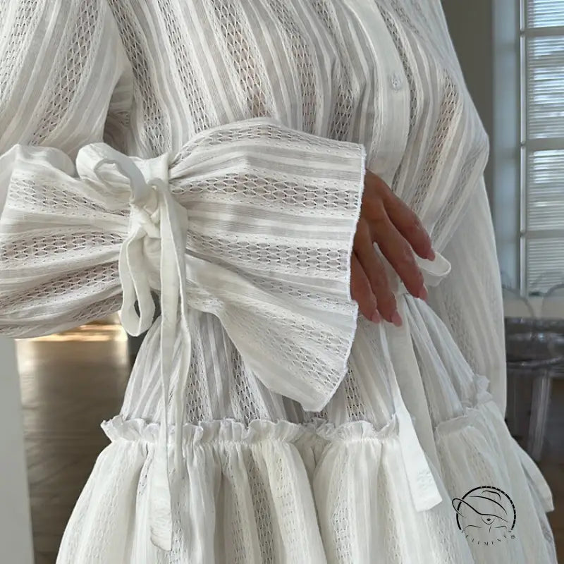 French Tie Ruffled long sleeve white lace dress with striped pattern and waist bow