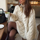 Cream cable knit oversized long sleeve sweater with bow tie detail