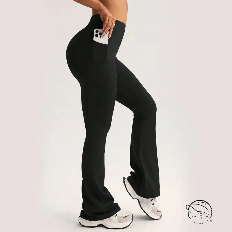 Black high-waisted flare yoga pants with side pocket, langry fashion ملابس