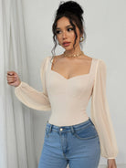 Elegant retro jumpsuit in beige sheer puff sleeve top with square neckline and pearl necklace, Langry fashion ملابس