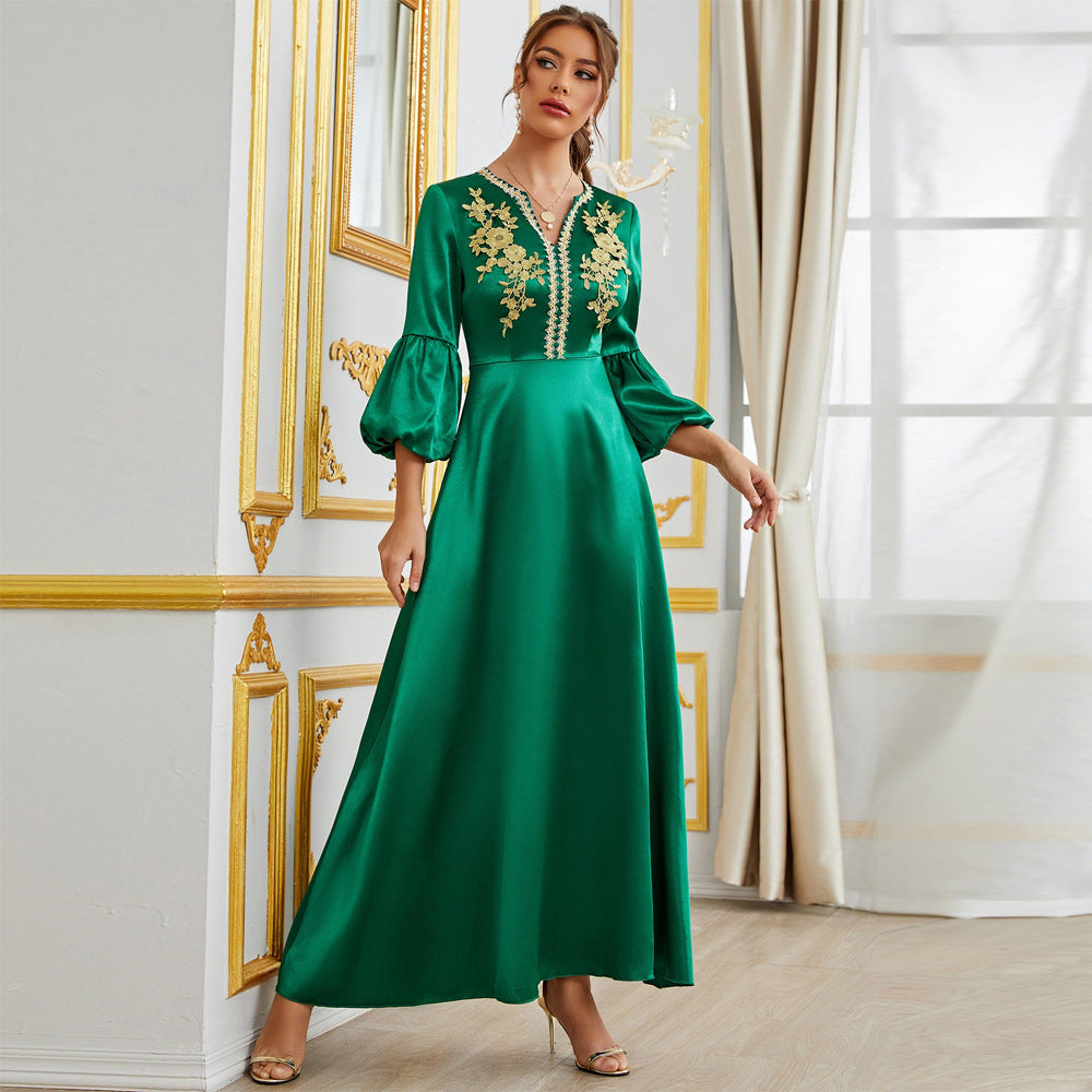 Emerald green Langry satin fashion dress with gold embroidery and bell sleeves