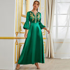 Emerald green Langry satin fashion dress with gold embroidery and bell sleeves