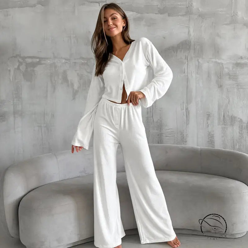 Smiling woman in knitted loose comfort pajamas set
