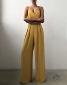 Mustard yellow strapless modern jumpsuit with pleated wide-leg pants