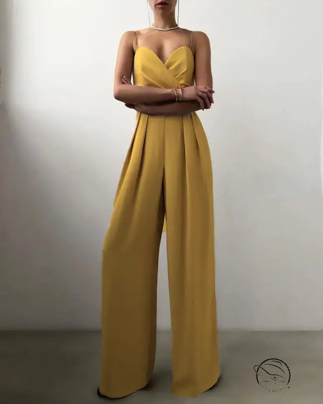 Mustard yellow strapless modern jumpsuit with pleated wide-leg pants