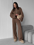 Brown knitted langry fashion jumpsuit with wide-leg pants and oversized sleeves