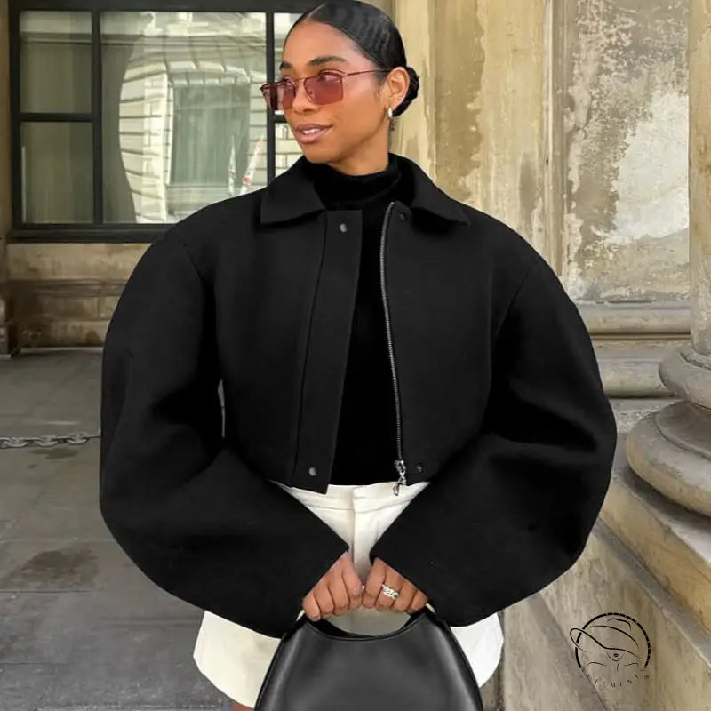 Black oversized langry fashion jacket with bell sleeves and zipper detail