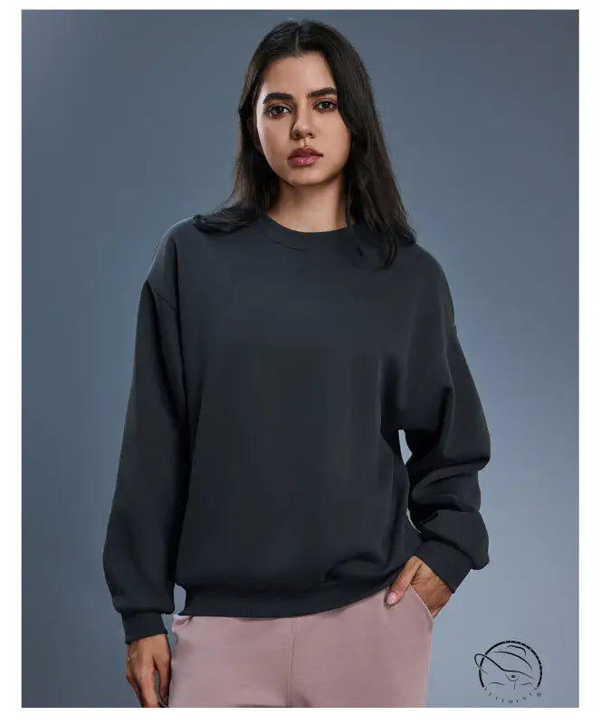 Charcoal gray long sleeve cotton blend crewneck sweatshirt with ribbed cuffs