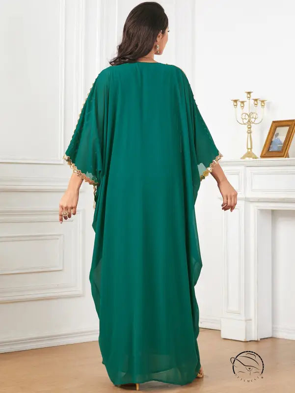 Emerald green chiffon langry kaftan with gold trim in fashion suit dress