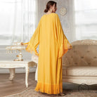 Yellow tassel langry fashion dress with bell sleeves and open back