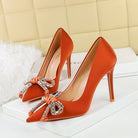 Light luxury langry fashion orange satin stiletto pumps with rhinestone bows