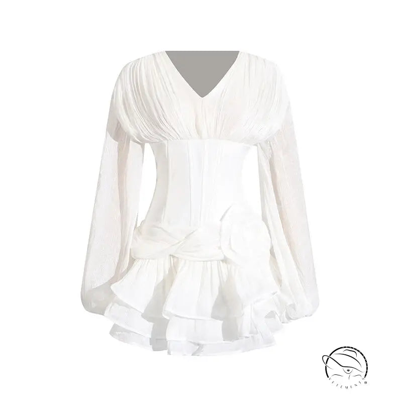 Elegant white ruffled langry fashion blouse with long sleeves and pleated bodice detailing