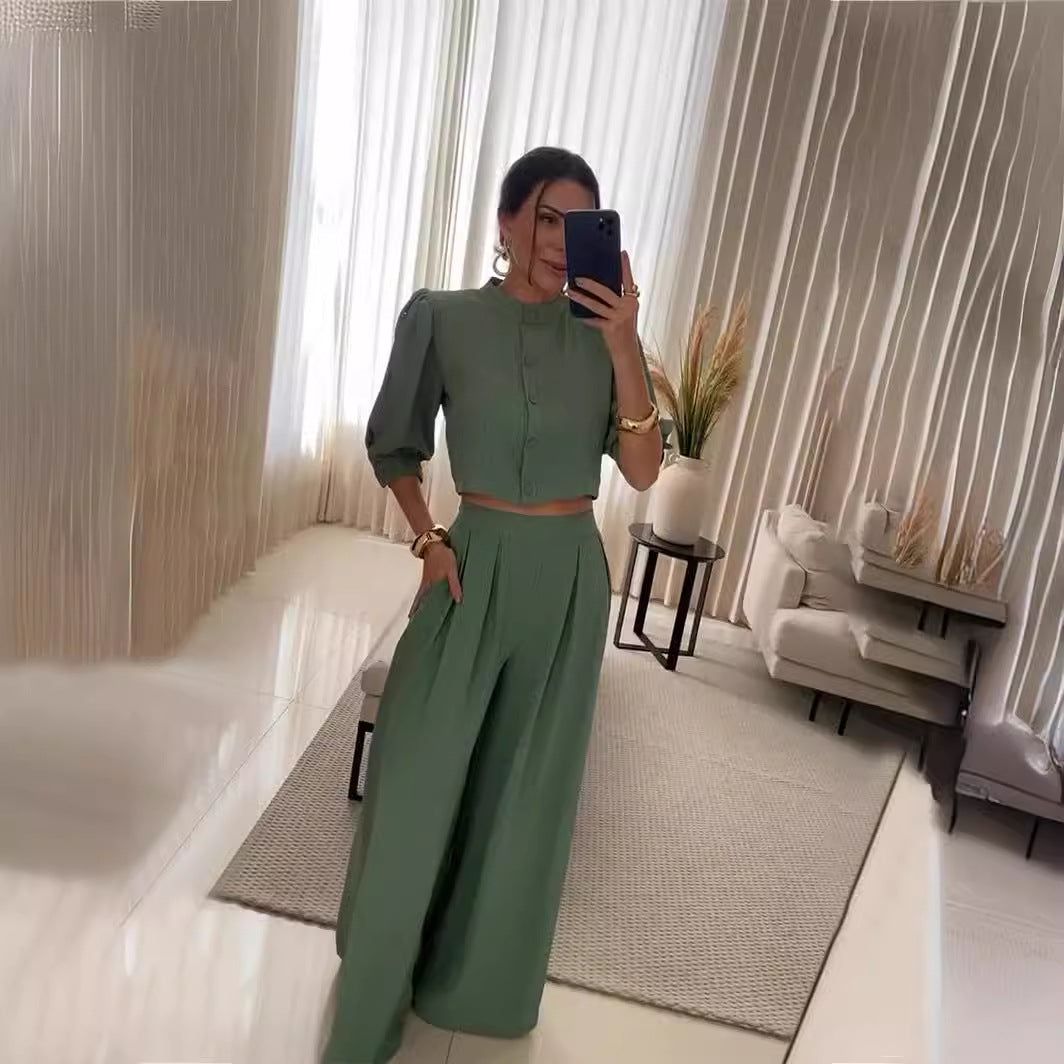 Woman wearing green crop top and wide-leg pants from Summer Striped Half Sleeve Top Trousers Suit Women Clothing collection, stylish ملابس for summer fashion