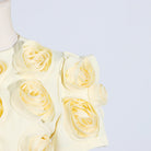 Delicate cream-colored roses enhance the French Sweet Summer Puff Sleeve Top and Skirt Set