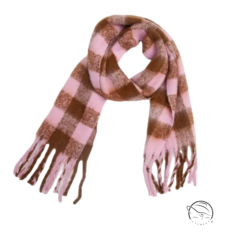 Checkered pink and brown fringed ends on a white wool scarf with colorful print