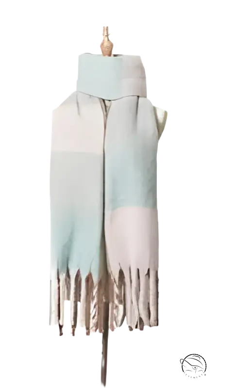 Mint green and white striped scarf with tassels displayed alongside a purplish red scarf