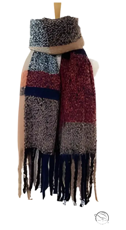 Knitted winter scarf in purplish red, gray, and navy blue with fringe tassels