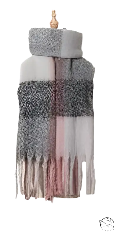 Soft plaid scarf in gray and pink tones with fringed edges, perfect for winter fashion