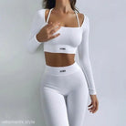 White ribbed AOMR skinny leggings two piece set with long-sleeved crop top and high waist