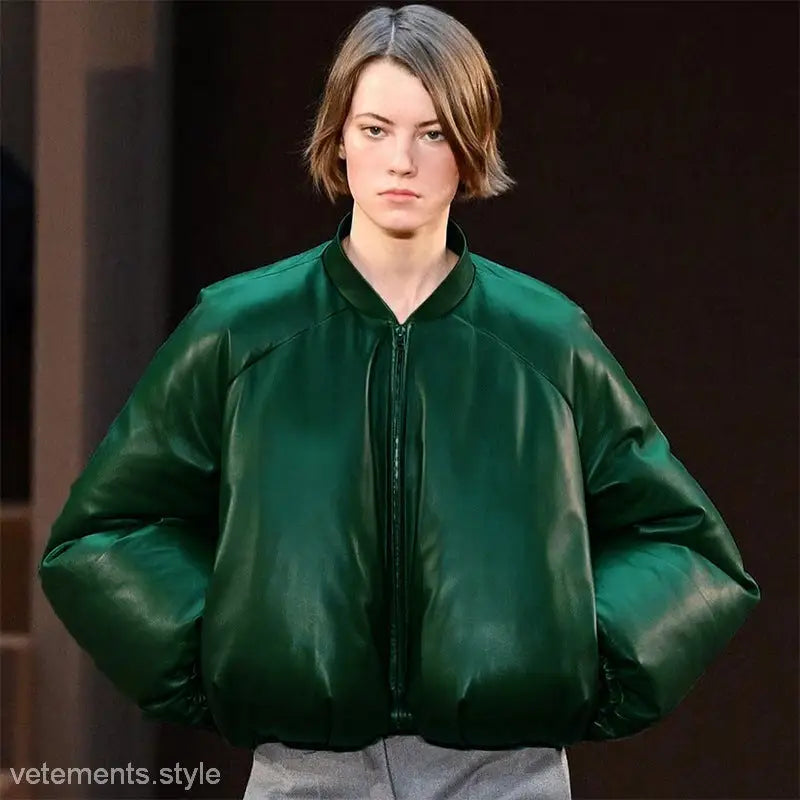 Model wearing army green cotton cozy jacket with zipper and front pockets