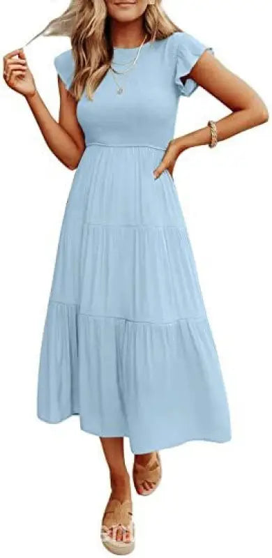 Light blue tiered midi dress featuring flounced large swing design and cutout details