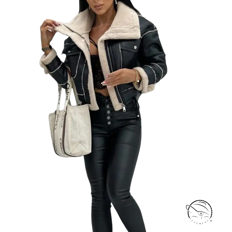 Woman in black leather faux shearling jacket and matching pants for fall and winter
