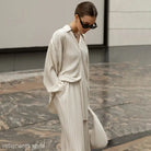 Pleated beige Ava Casual Set featuring a long sleeve top and straight leg pants