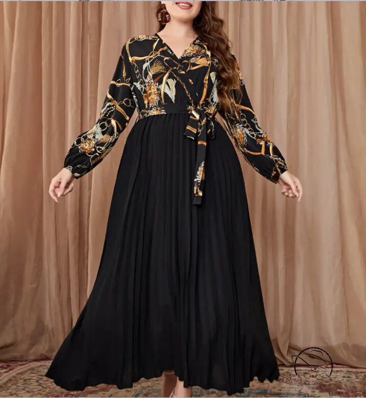 Long-sleeved chain-patterned top with pleated black skirt for a beautiful evening dress
