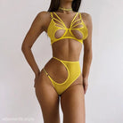 Bright yellow bikini with cutouts from a sexy lace five piece set for stunning allure