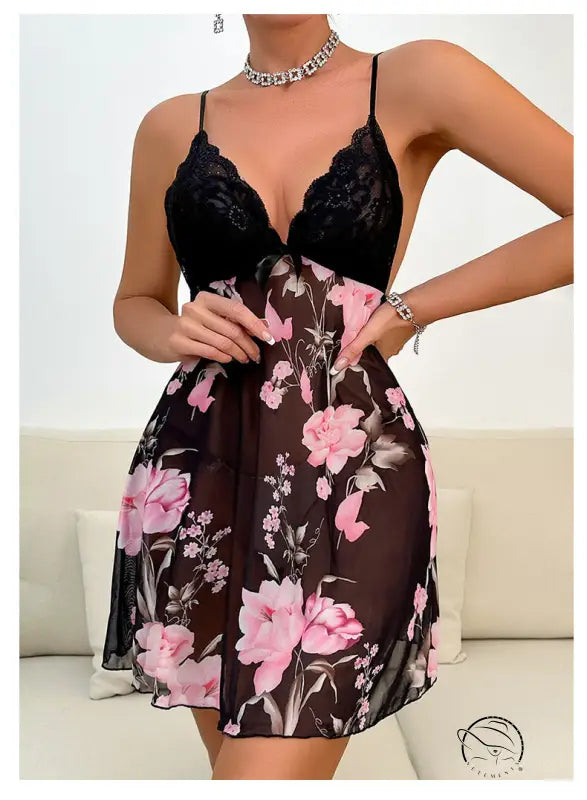 Floral print dress with black lace bodice and spaghetti straps.