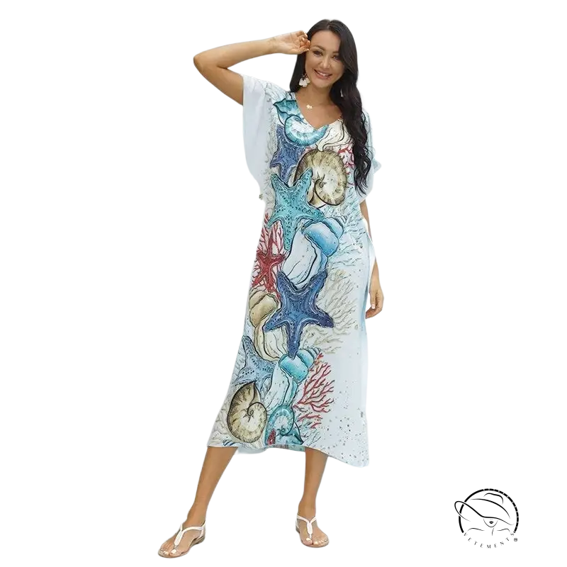 Bohemian beach cover with underwater print of starfish, shells, and coral