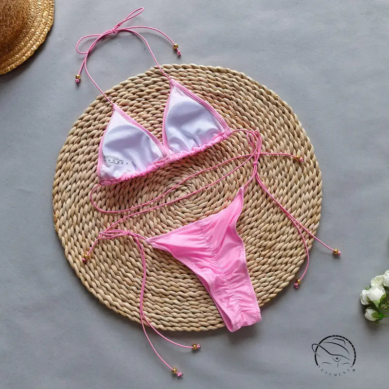 Pink string bikini shown in Boho Bikini Rope Halter Top for summer vacations