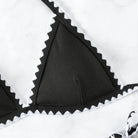 Black ribbed bikini top with white scalloped trim from Boho Black & White collection