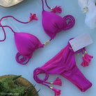 Bright fuchsia rope swimsuit bikini with braided string ties and tassel details