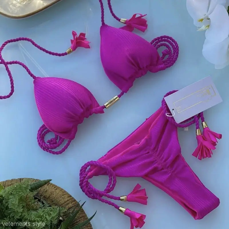 Bright fuchsia rope swimsuit bikini with braided string ties and tassel details