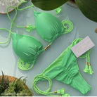 Bright green ribbed rope swimsuit bikini with braided ties and gold accents