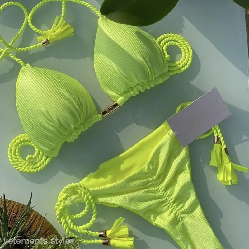 Bright lime green Boho Nylon Rope Swimsuit Bikini featuring braided string ties and tassels