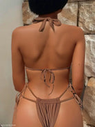 Brown string bikini featuring a sexy swimsuit strap and nylon tie halter design