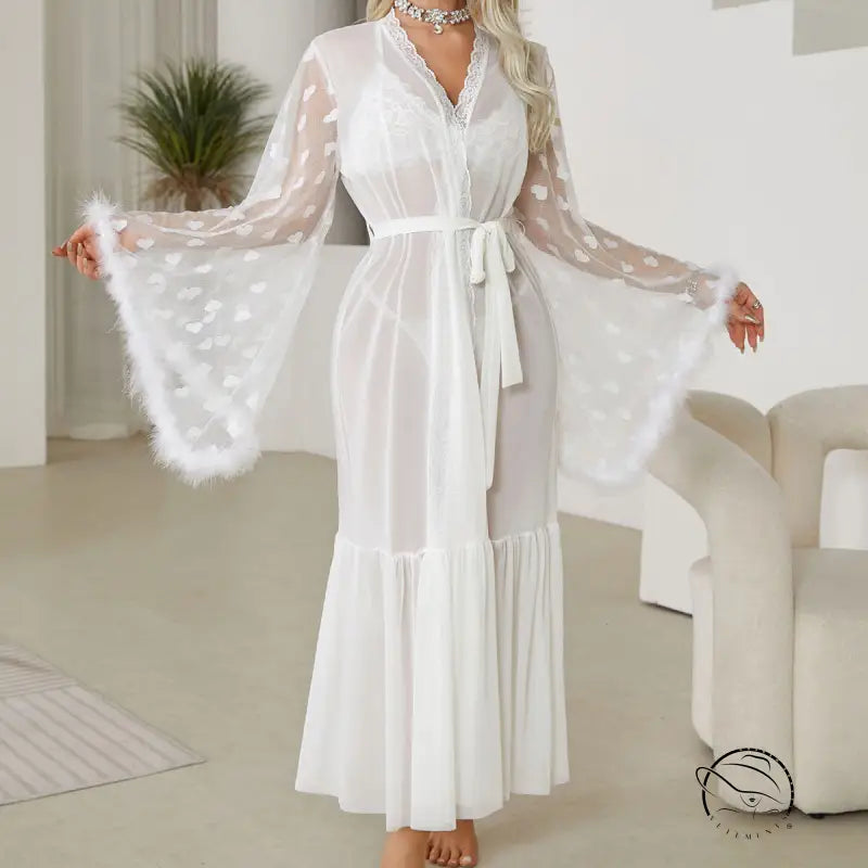 White sheer robe with bell sleeves and a tie waist.