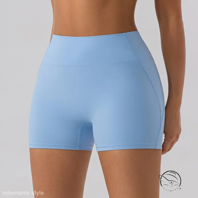 Light blue close fitting yoga shorts in comfy slim nylon