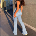 Ripped light-wash flared jeans in high waist retro style with stretch slim fit for all seasons